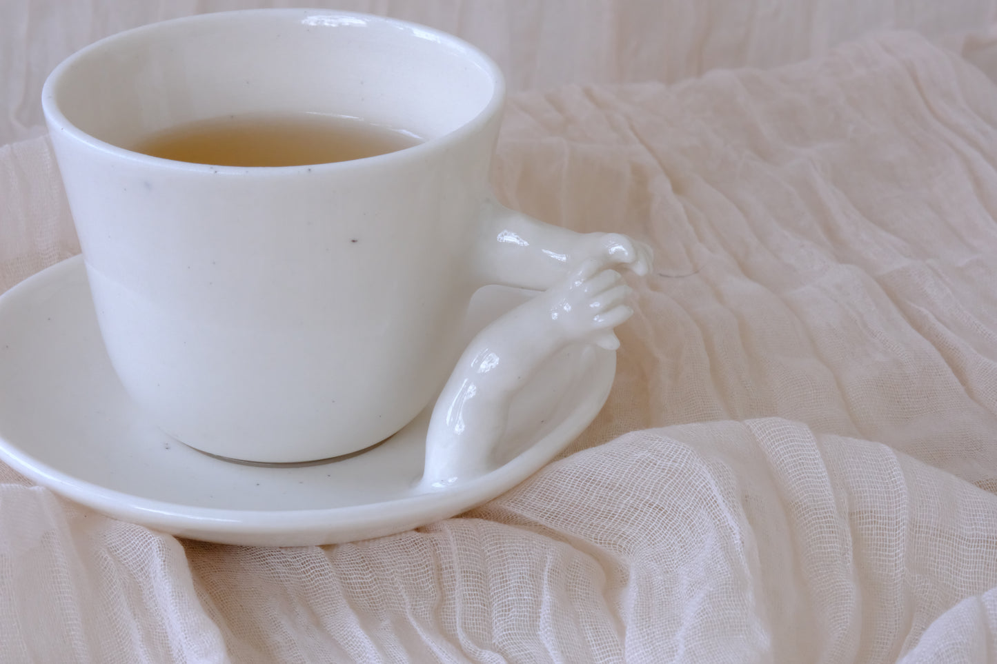 Touching Cup and Saucer Set